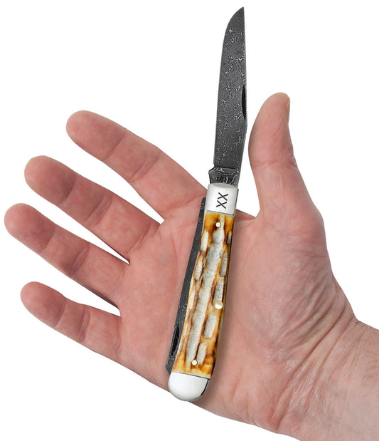 Case Deep Canyon Jigged Burnt Natural Bone Trapper Raindrop Damascus