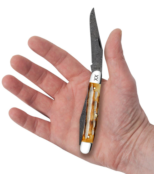 Case Deep Canyon Jigged Burnt Natural Bone Muskrat Raindrop Damascus